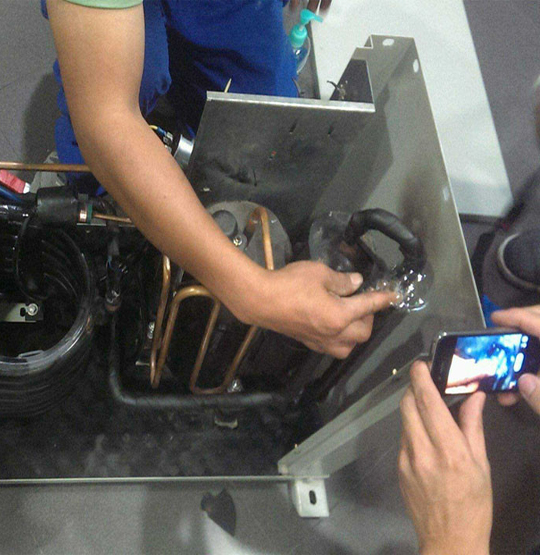 聂荣维修空调制冷效果差